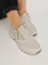 Sneakers comfort con tacco rialzato